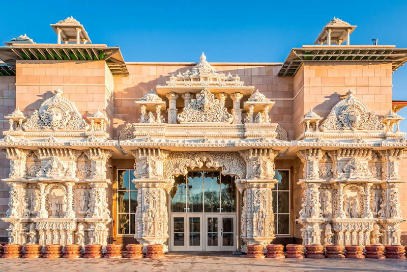 The temple is bathed in the glow of the setting sun following the opening ceremony in Robbinsville, New Jersey. Photo credit- Getty Images/Mihai Andritoiu.      